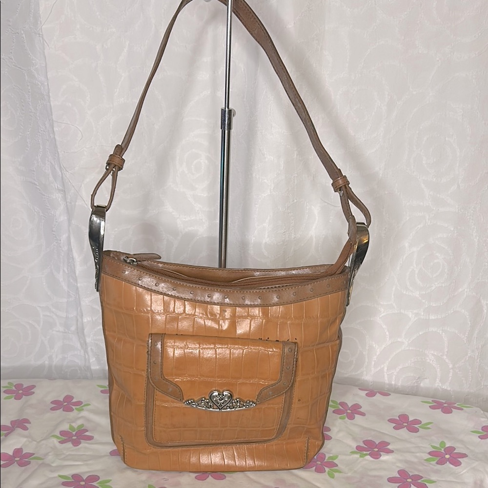 MC Marc Chantal caramel brown leather embossed hand bag with silver hardware.